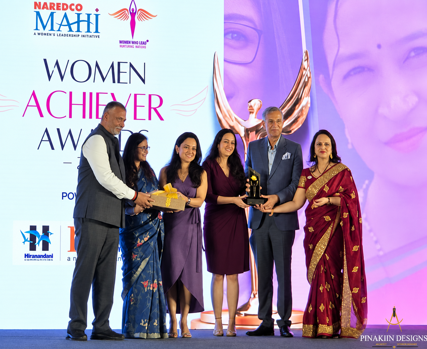 Women Achievers Award presentation on stage